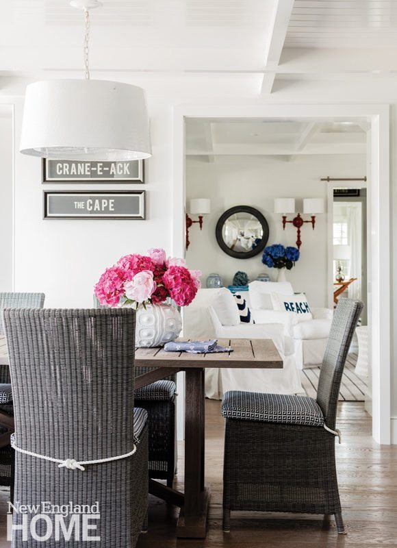 Cape Cod Cottage Chic New England Home The Indoor Outdoor Dining Table Wicker Chairs And Cushions Were Chosen For Their Easy Care Relaxed Style An Open Floor Plan Creates A Casual
