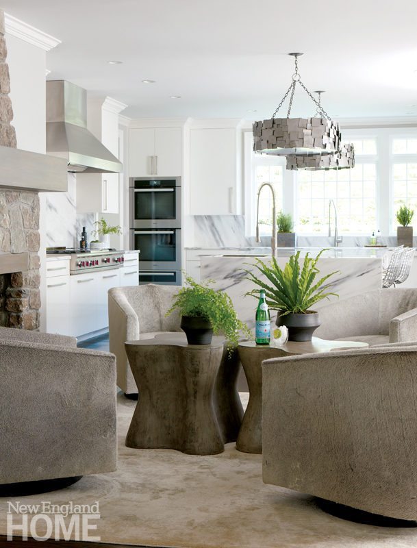 Galleries New England Home Comfy Cowhide Covered Swivel Chairs Fill The Sitting Space Off Kitchen