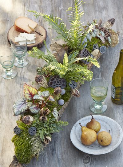 floral arrangement in log