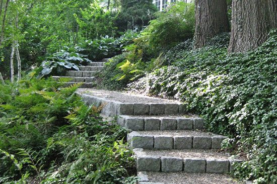 Shady hillside steps by Sudbury Design Group