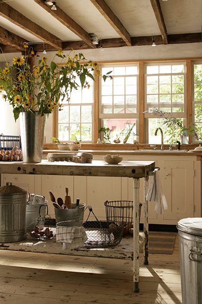 Rustic kitchen styled with summer flowers