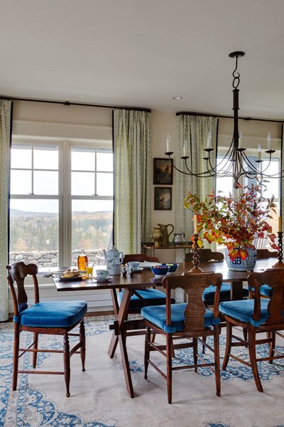 Styling a room casual dining room with blue chairs