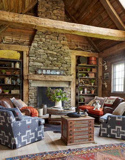 Styling a room Family room with stone fireplace