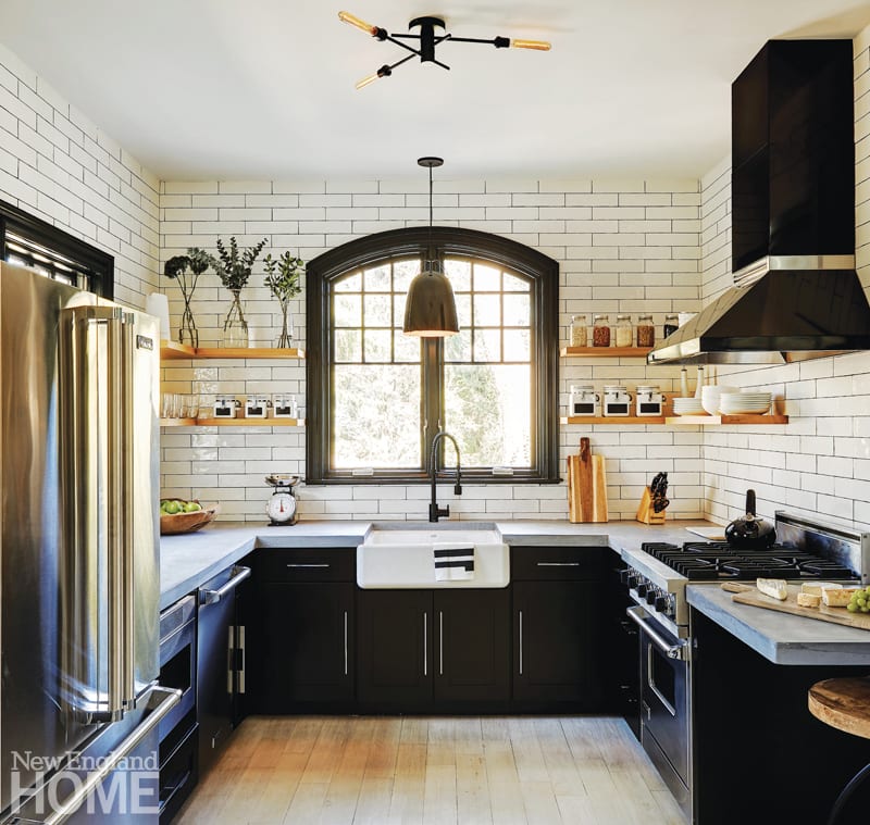 New England Home Connecticut ten years subway tiles and black cabinets